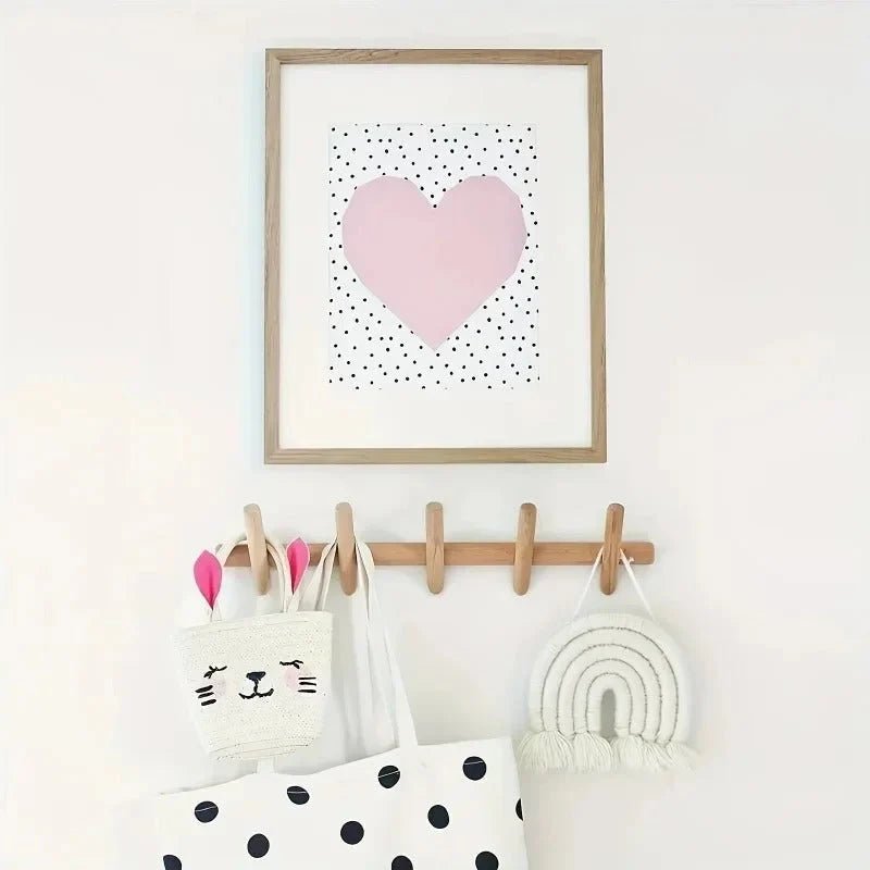 Wall mounted coat rack featuring 5 rounded pegs, crafted from solid oak in a stylish Scandinavian design, perfect for organizing coats and accessories in any entry 2