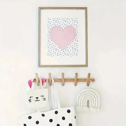 Wall mounted coat rack featuring 5 rounded pegs, crafted from solid oak in a stylish Scandinavian design, perfect for organizing coats and accessories in any entry 2