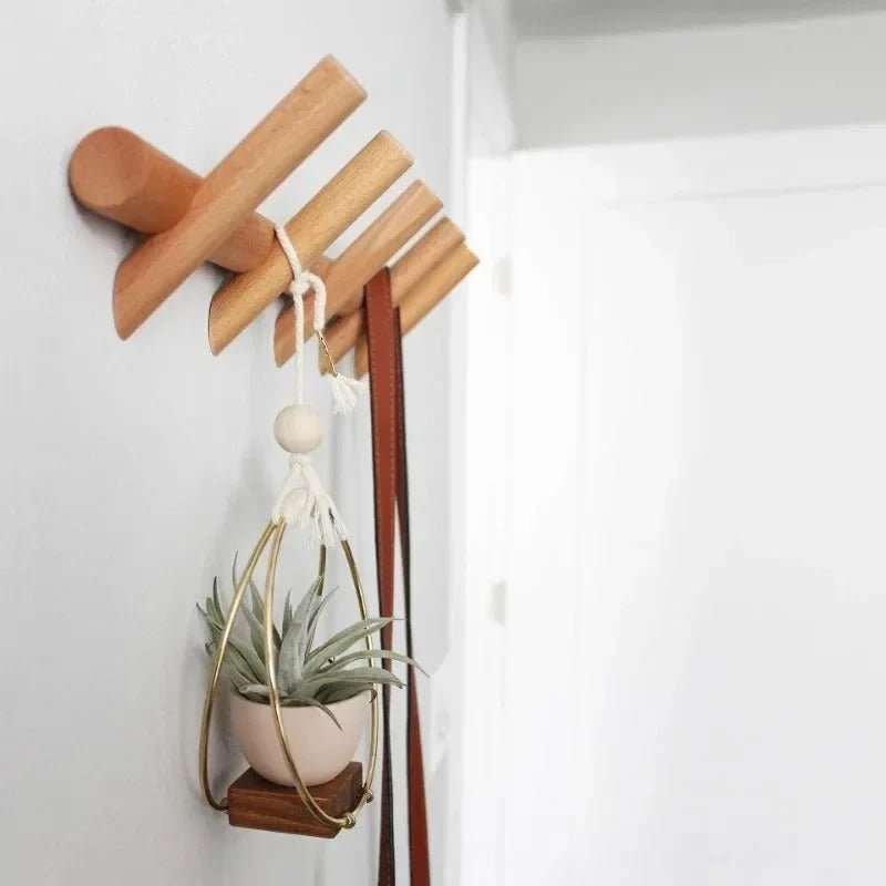 Wall mounted coat rack featuring 5 rounded pegs, crafted from solid oak in a stylish Scandinavian design, perfect for organizing coats and accessories in any entry 0