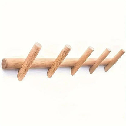 Wall mounted coat rack featuring 5 rounded pegs, crafted from solid oak in a stylish Scandinavian design, perfect for organizing coats and accessories in any entry 3