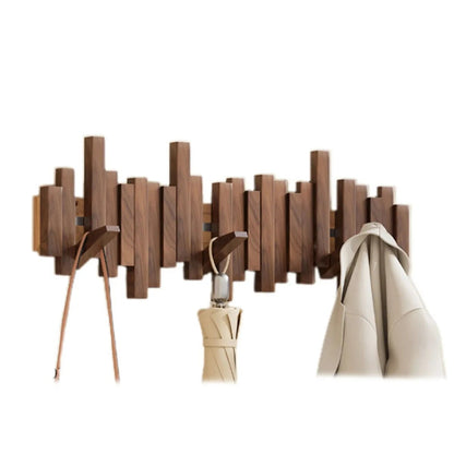 Wall mounted coat rack featuring a minimalist design in walnut or beech wood, ideal for stylish entryway organization with multiple hooks for coats and accessories. 1