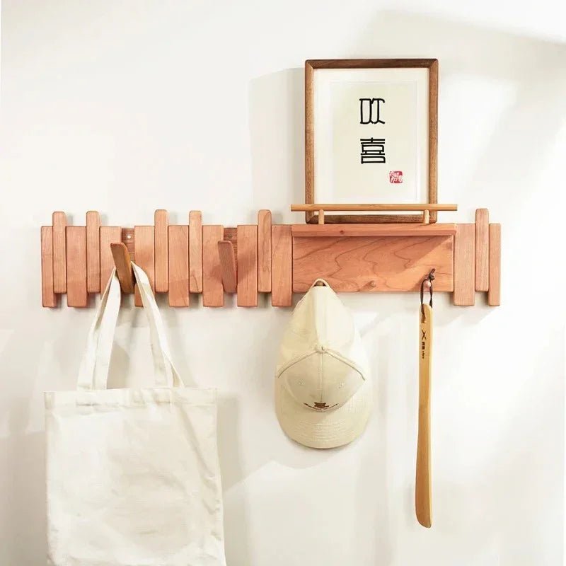 Wall-mounted coat rack featuring a unique piano key design, crafted from solid wood for durability and style, perfect for space-saving organization in entryways or hall 1