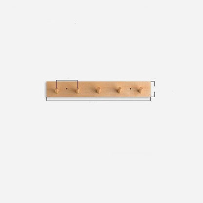 Wall mounted coat rack featuring round pegs, crafted from minimalist solid wood in walnut or beech, perfect for modern entryway decor. 7
