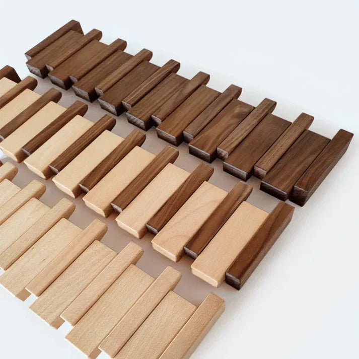 Wall-mounted wooden coat rack featuring foldable hooks in a stylish piano key design, crafted from solid timber for durability and elegance. 5