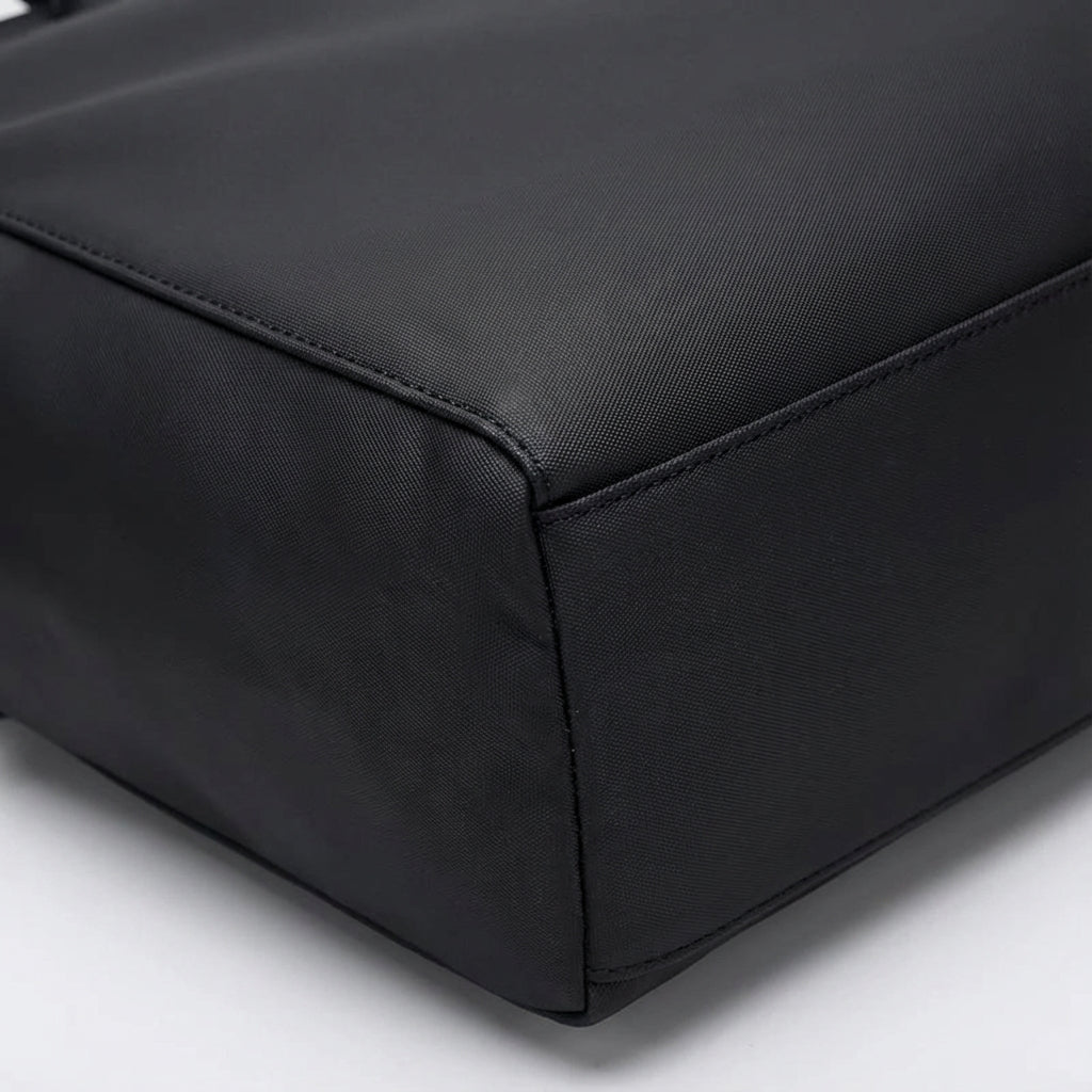 Water-repellent laptop bag featuring an adjustable strap, designed for casual business use with multiple compartments for organization. 2