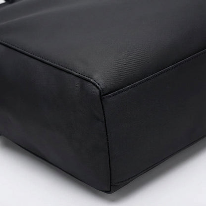 Water-repellent laptop bag featuring an adjustable strap, designed for casual business use with multiple compartments for organization. 2