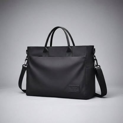Water-repellent laptop bag featuring an adjustable strap, designed for casual business use with multiple compartments for organization. 1