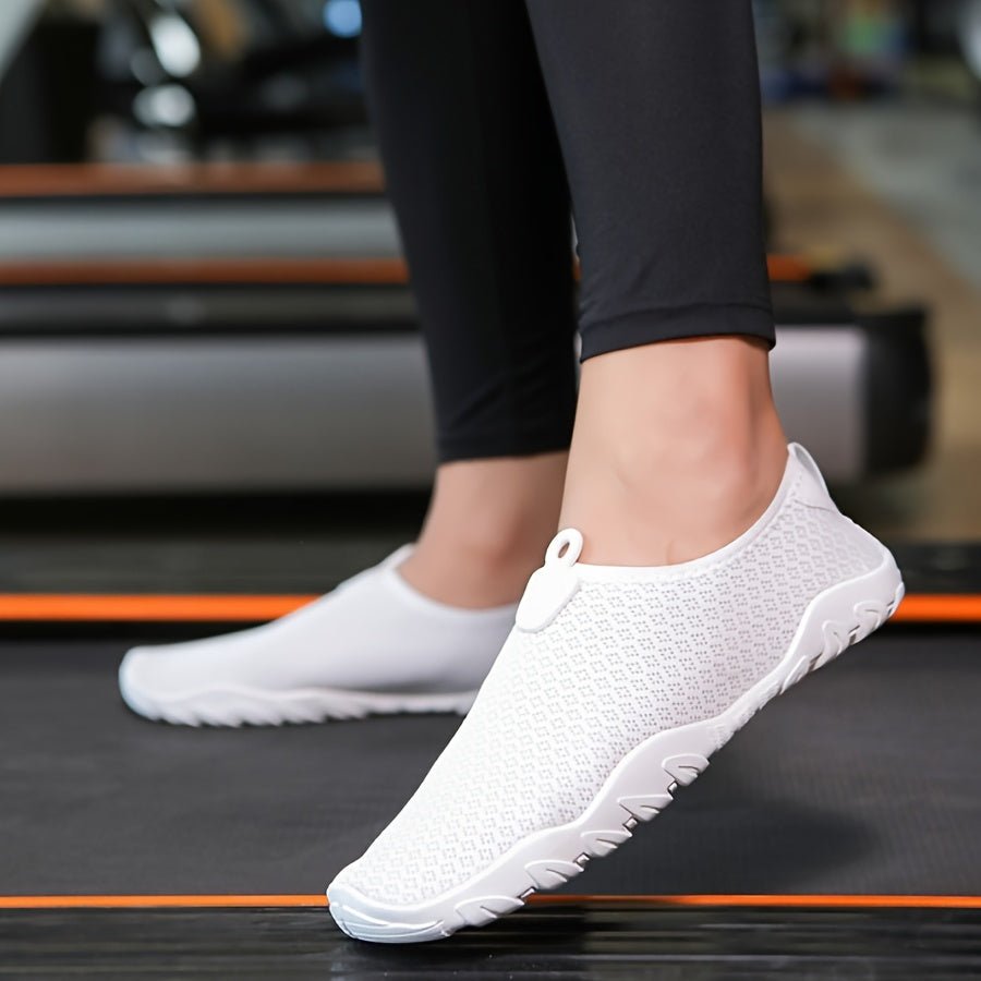 Water shoes for women featuring a quick-dry breathable mesh upper and a non-slip rubber sole, perfect for beach and swimming activities. 1