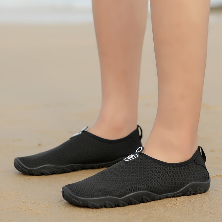 Water shoes for women featuring a quick-dry breathable mesh upper and a non-slip rubber sole, perfect for beach and swimming activities. 9