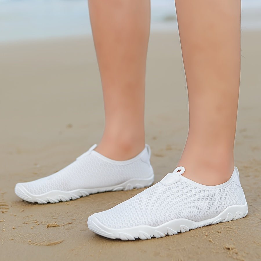 Water shoes for women featuring a quick-dry breathable mesh upper and a non-slip rubber sole, perfect for beach and swimming activities. 2