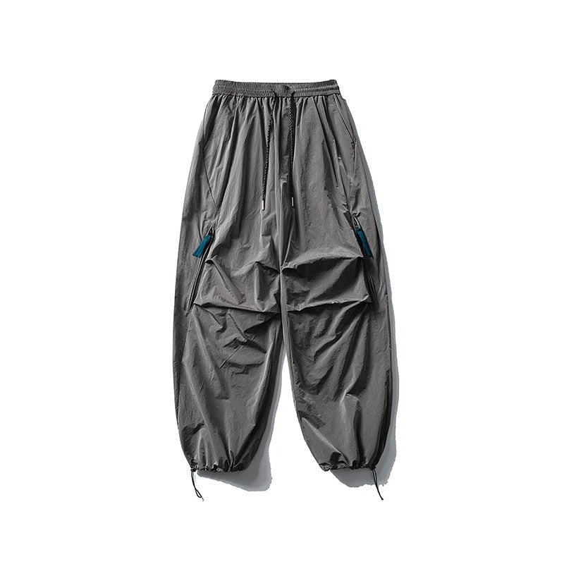 Waterproof hiking pants featuring quick-dry fabric and an elastic waist, designed for durability and comfort in outdoor activities for both men and women. 4