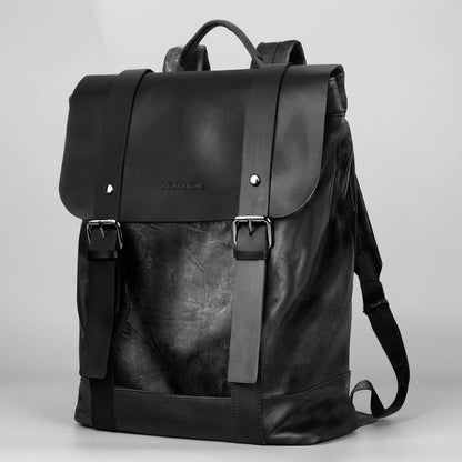 Waterproof leather laptop backpack featuring padded straps and multiple pockets, designed for style and durability, perfect for everyday use. 4