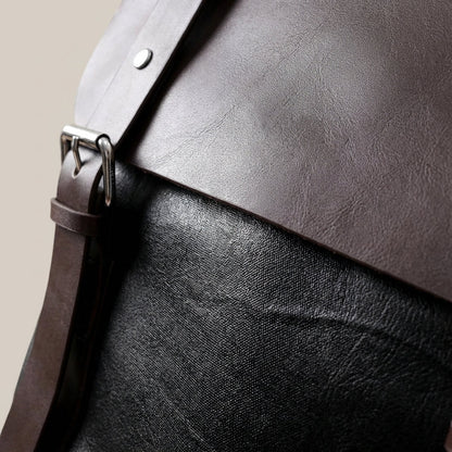 Waterproof leather laptop backpack featuring padded straps and multiple pockets, designed for style and durability, perfect for everyday use. 3