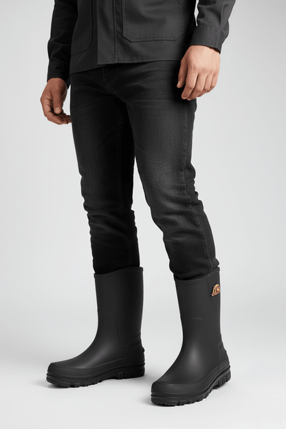 Waterproof rain boots for men featuring a slip-resistant sole and mid-calf outdoor design, ideal for wet conditions and outdoor activities. 1