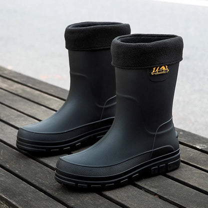 Waterproof rain boots for men featuring a slip-resistant sole and mid-calf outdoor design, ideal for wet conditions and outdoor activities. 3