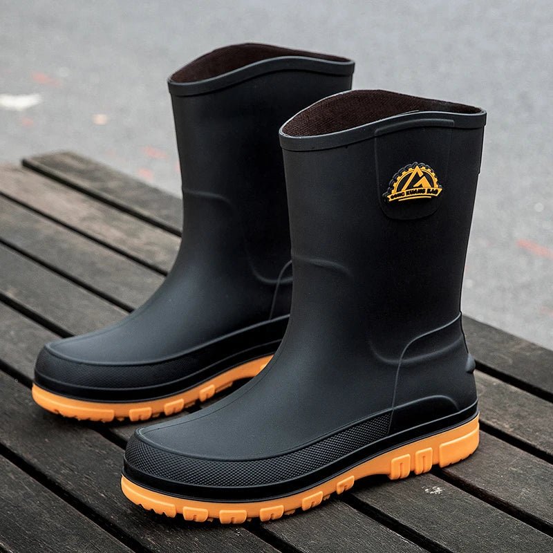 Waterproof rain boots for men featuring a slip-resistant sole and mid-calf outdoor design, ideal for wet conditions and outdoor activities. 6