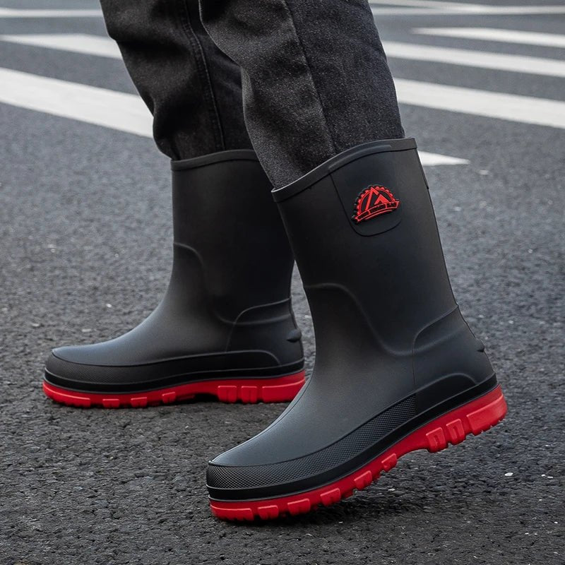 Waterproof rain boots for men featuring a slip-resistant sole and mid-calf outdoor design, ideal for wet conditions and outdoor activities. 4