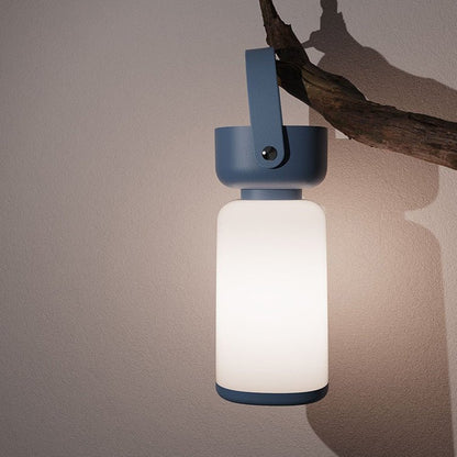 Waterproof table lamp featuring a modern cylinder design, equipped with a USB rechargeable function, perfect for both indoor and outdoor use. 1