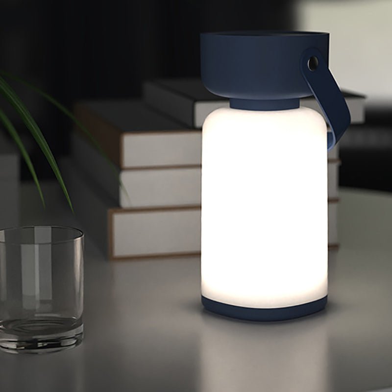 Waterproof table lamp featuring a modern cylinder design, equipped with a USB rechargeable function, perfect for both indoor and outdoor use. 2