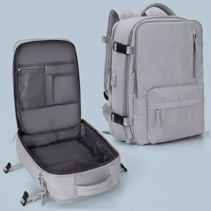 Waterproof travel backpack made of durable Oxford fabric, featuring multiple pockets for organized storage, ideal for carry-on and day trips. 7