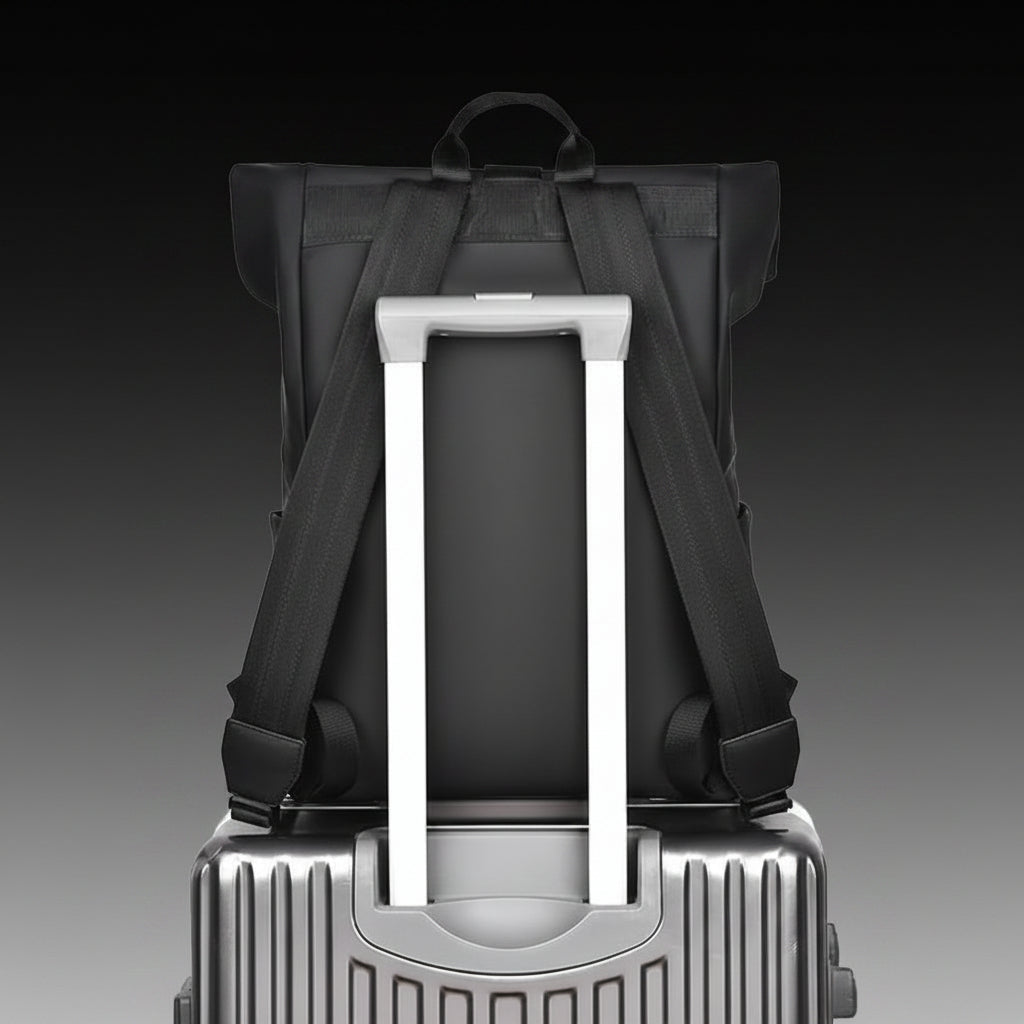 Waterproof travel backpack in minimalist black design featuring a USB charging port and roll-top closure, ideal for carrying laptops and daily essentials. 3