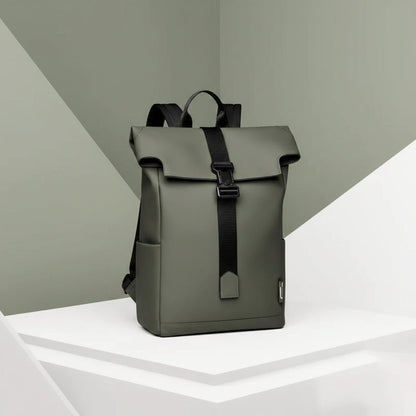 Waterproof travel backpack in minimalist black design featuring a USB charging port and roll-top closure, ideal for carrying laptops and daily essentials. 2