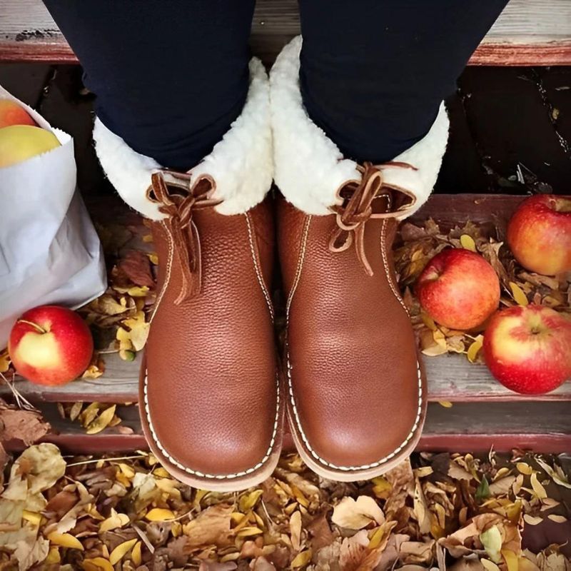 Waterproof winter boots for women featuring a cozy fur-lined interior and a convenient slip-on design, perfect for cold weather protection and comfort. 8