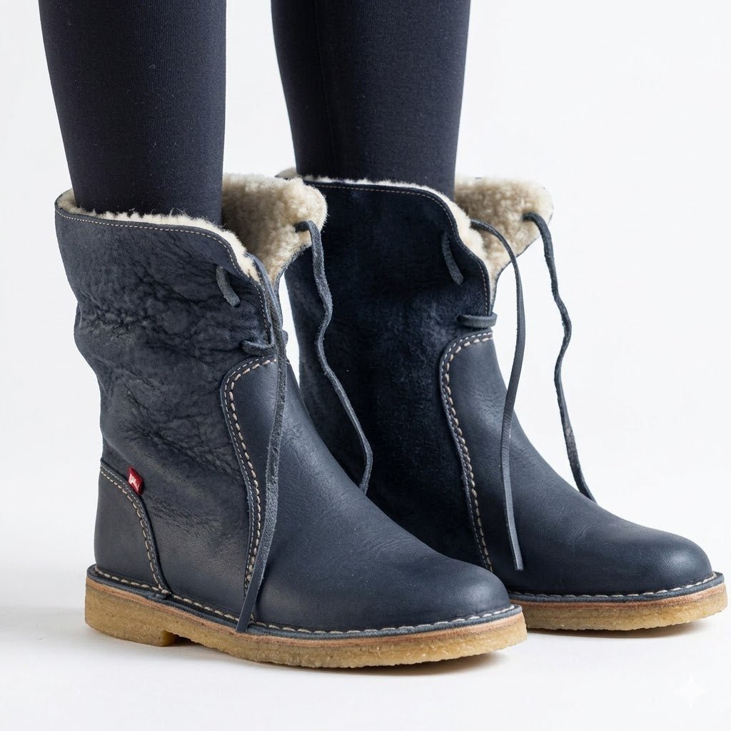 Waterproof winter boots for women featuring a cozy fur-lined interior and a convenient slip-on design, perfect for cold weather protection and comfort. 0