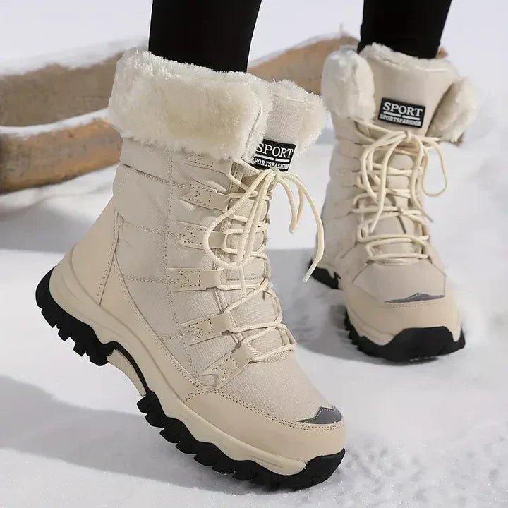Waterproof winter boots for women featuring thermal insulation and a slip-resistant outsole, ideal for stylish outdoor use in snow and cold conditions. 0