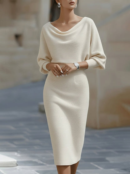 Elegant white midi dress featuring a stylish cowl neckline and flowing batwing sleeves, perfect for any formal occasion or evening event. 2