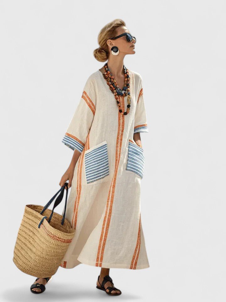 White long sleeve maxi dress featuring a flattering fit, perfect for elegant occasions and comfortable wear, showcasing a beautiful floor-length design. 5