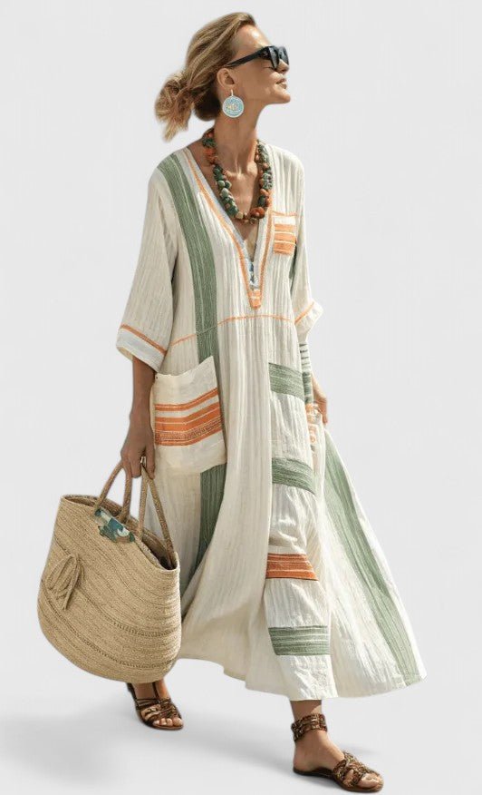 White long sleeve maxi dress featuring a flattering fit, perfect for elegant occasions and comfortable wear, showcasing a beautiful floor-length design. 7