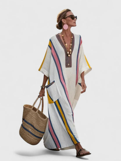 White long sleeve maxi dress featuring a flattering fit, perfect for elegant occasions and comfortable wear, showcasing a beautiful floor-length design. 3
