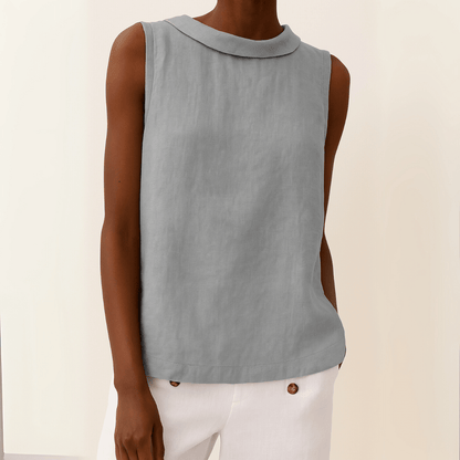 White sleeveless top with a rolled collar, perfect for summer, showcasing a chic and elegant design for women's fashion. 0