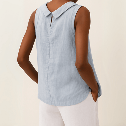 White sleeveless top with a rolled collar, perfect for summer, showcasing a chic and elegant design for women's fashion. 3