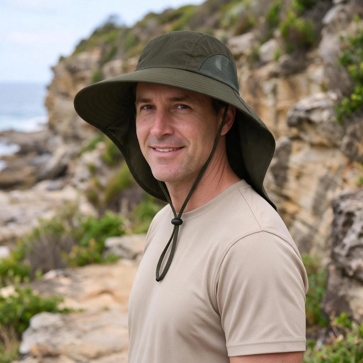 Wide brim bucket hat featuring UPF50+ sun protection, breathable mesh panels, and an adjustable leopard print design for stylish outdoor wear. 4