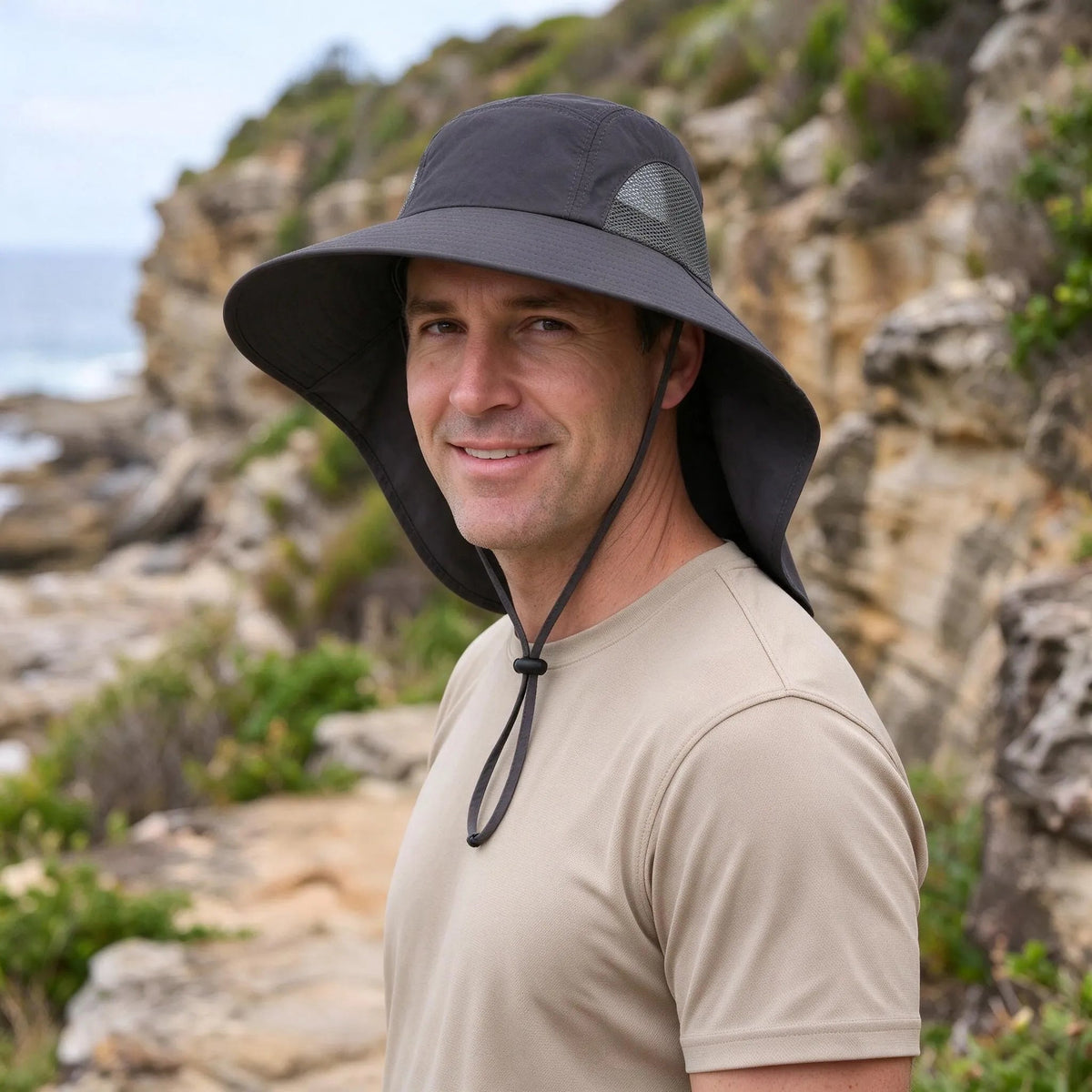 Wide brim bucket hat featuring UPF50+ sun protection, breathable mesh panels, and an adjustable leopard print design for stylish outdoor wear. 3