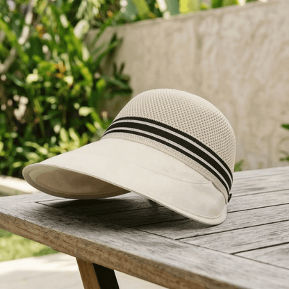 Wide brim sun hat featuring a breathable knit crown and adjustable fit, perfect for ladies seeking sun protection during summer outdoor activities. 7