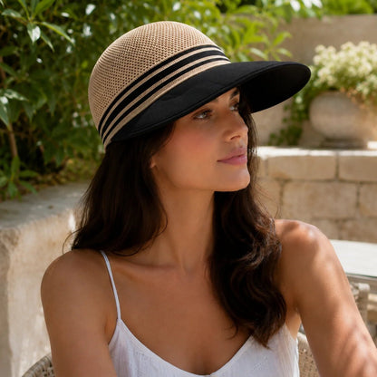 Wide brim sun hat featuring a breathable knit crown and adjustable fit, perfect for ladies seeking sun protection during summer outdoor activities. 1