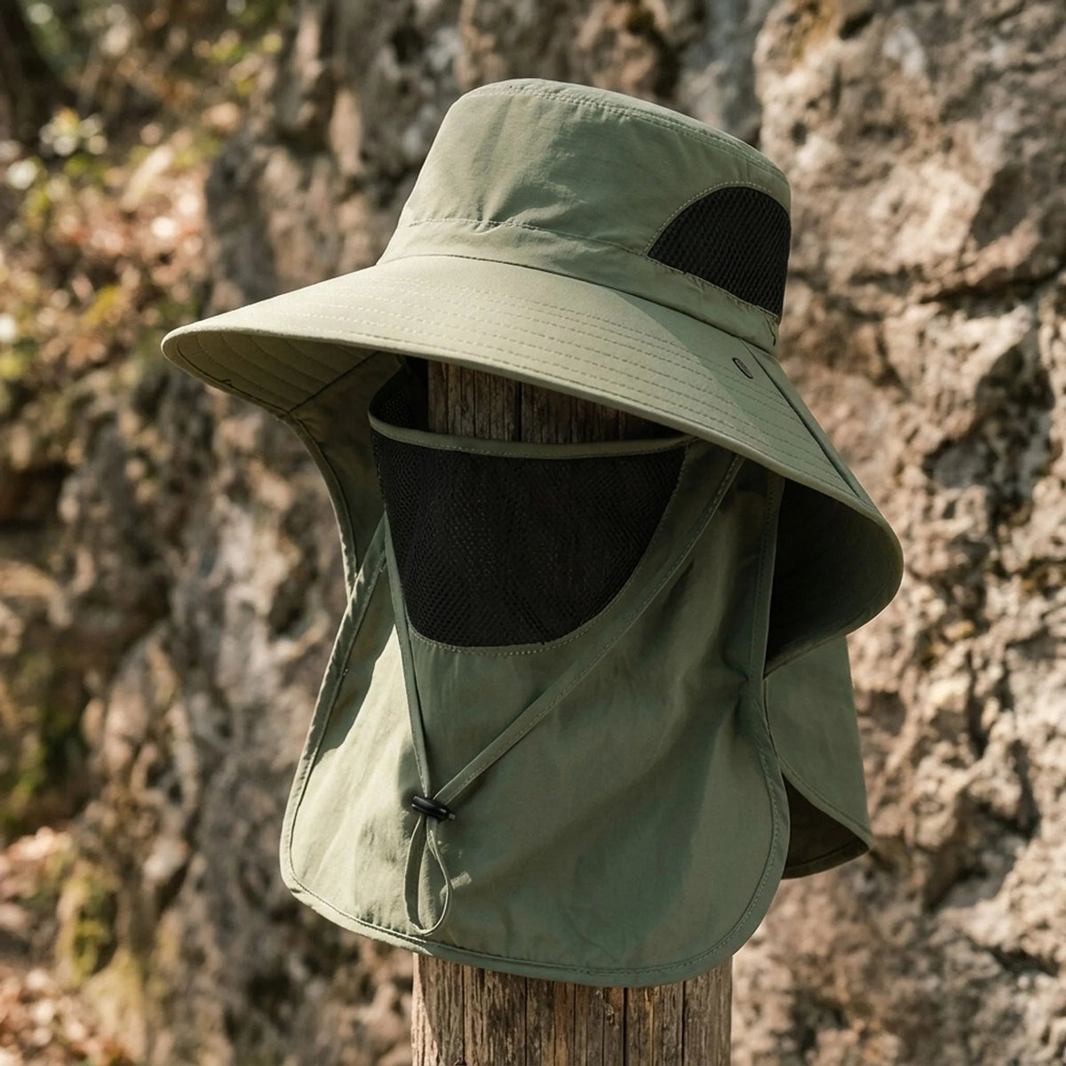 Wide brim sun hat with neck and face covers, made of lightweight polyester, providing outdoor sun protection for women. 0