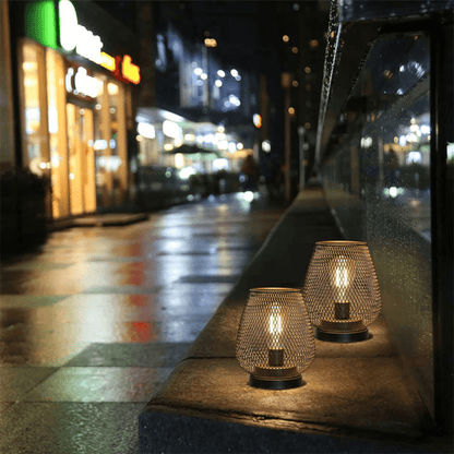 Wireless LED lantern featuring a sleek modern metal design, adjustable brightness settings, perfect for both indoor and outdoor use. 6