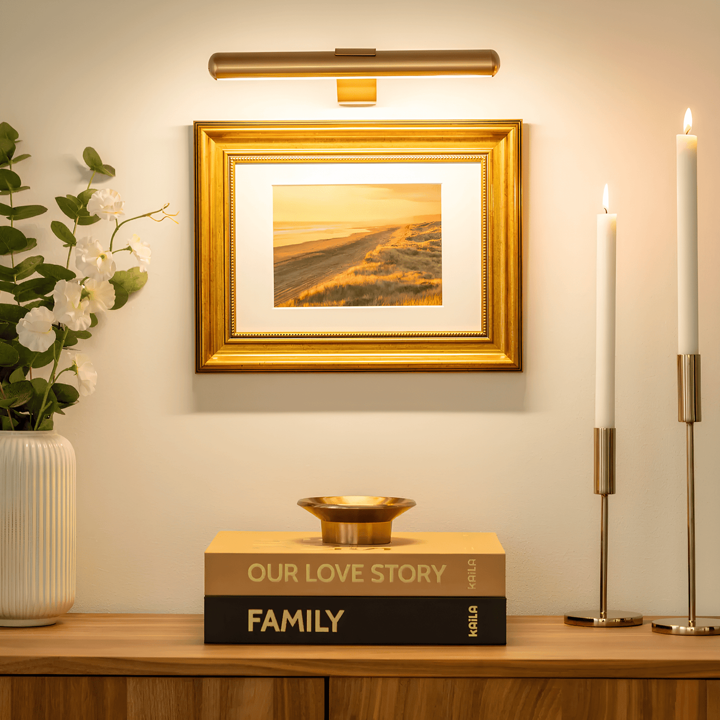 Wireless LED picture light featuring a sleek modern design, dimmable brightness, and a 360° rotating head, perfect for illuminating artwork and photographs; 7