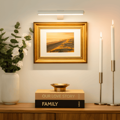Wireless LED picture light featuring a sleek modern design, dimmable brightness, and a 360° rotating head, perfect for illuminating artwork and photographs; 8