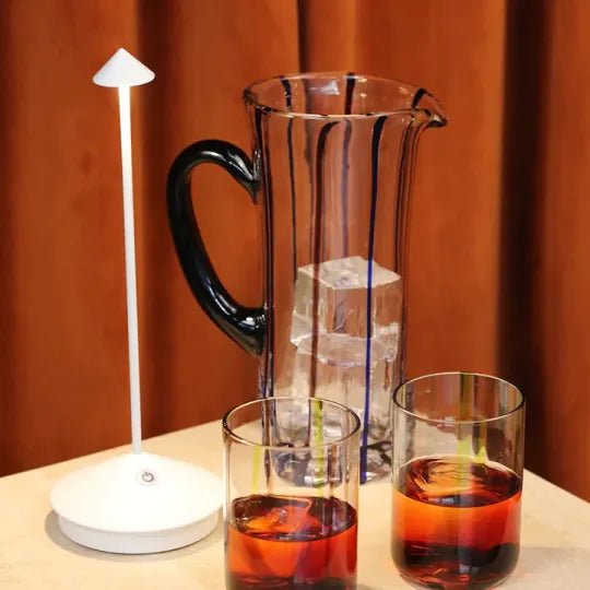 Wireless LED table lamp featuring adjustable dimmable brightness and a waterproof design, perfect for indoor and outdoor use, with a sleek modern appearance and cordless battery 3