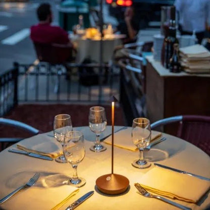 Wireless LED table lamp featuring adjustable dimmable brightness and a waterproof design, perfect for indoor and outdoor use, with a sleek modern appearance and cordless battery 1