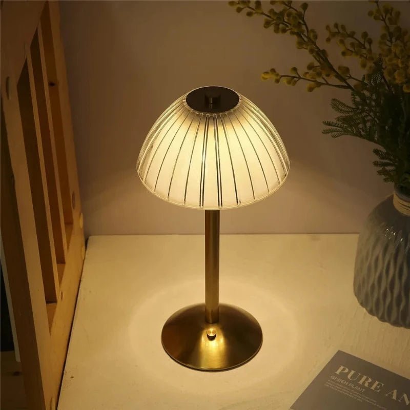 Wireless LED table lamp featuring a touch sensor and dimmable light, designed with a crystal-inspired cordless design for elegant home decor. 3