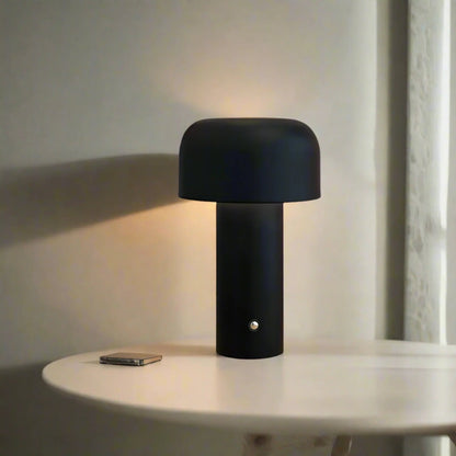 Wireless metal table lamp featuring a sleek design, dimmable LED light, and a rechargeable battery for versatile lighting solutions in any space. 3