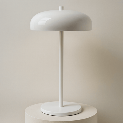 Wireless table lamp featuring a sleek metal design, dimmable LED functionality, perfect for modern bedside or desk use, and rechargeable for convenience. 0