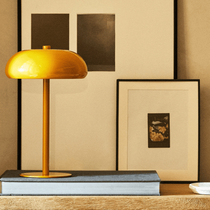 Wireless table lamp featuring a sleek metal design, dimmable LED functionality, perfect for modern bedside or desk use, and rechargeable for convenience. 5