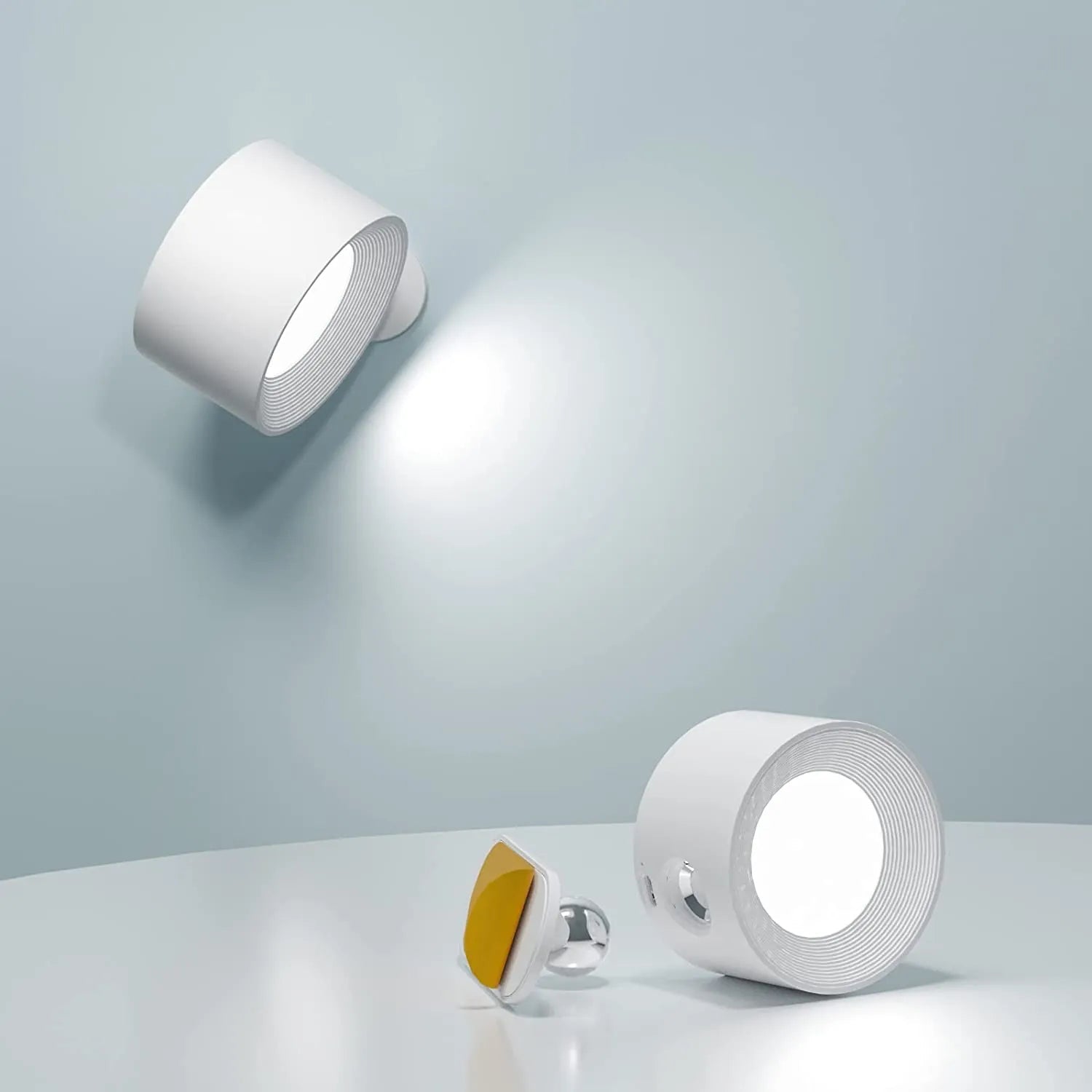 Wireless wall lamp featuring a minimalist design, 360° rotation, and dimmable LED, perfect for modern home decor and versatile lighting solutions. Recharge 0
